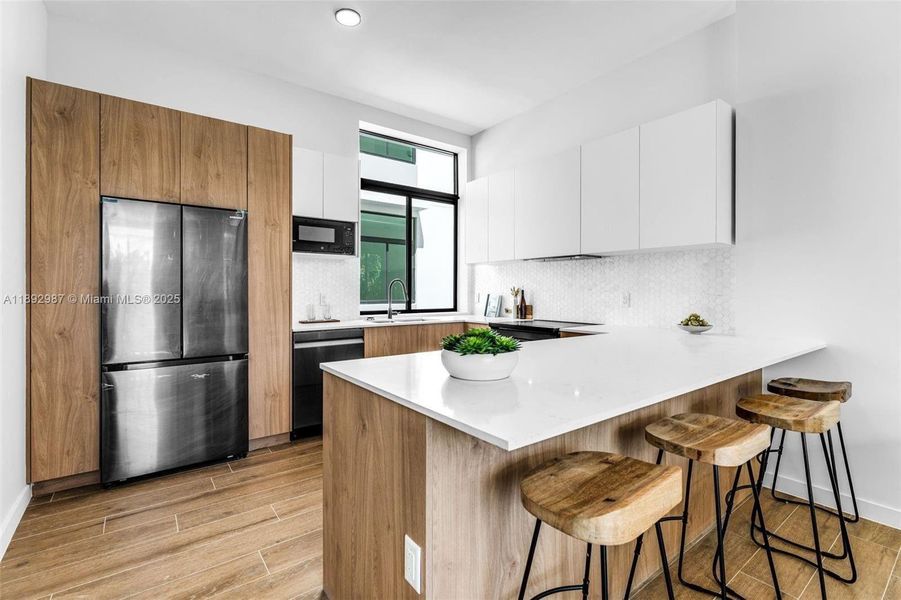 OPEN FLOOR PLAN CAN BE SET UP IN MULTIPLE WAYS. BREAKFAST BAR KITCHEN. OPEN FLOOR PLAN CAN BE SET UP IN MULTIPLE WAYS. BREAKFAST BAR KITCHEN.