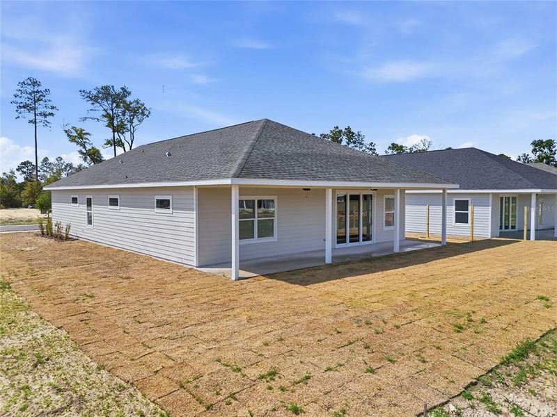 Exterior details and patio area of a home in Grand Oaks, Gainesville (Image 21).