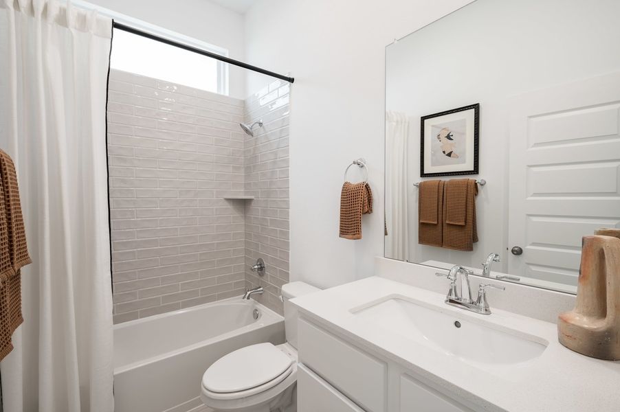 Representative furnished interior of a home built from the Wren by Tri Pointe Homes in Oakhill Reserve, Tomball (Image 32).