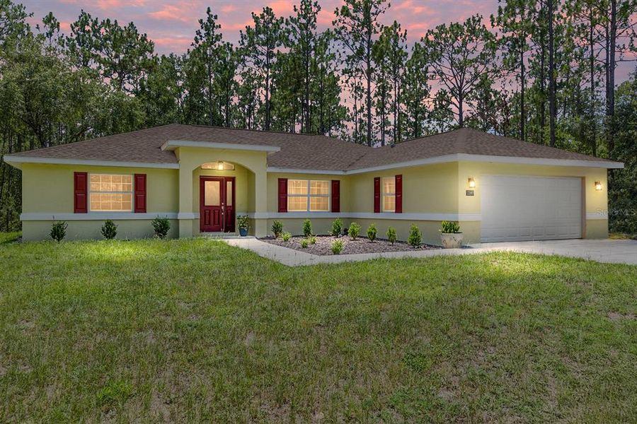 Front exterior of a new home in Rainbow Springs, Dunnellon, FL, highlighting curb appeal (Image 20).