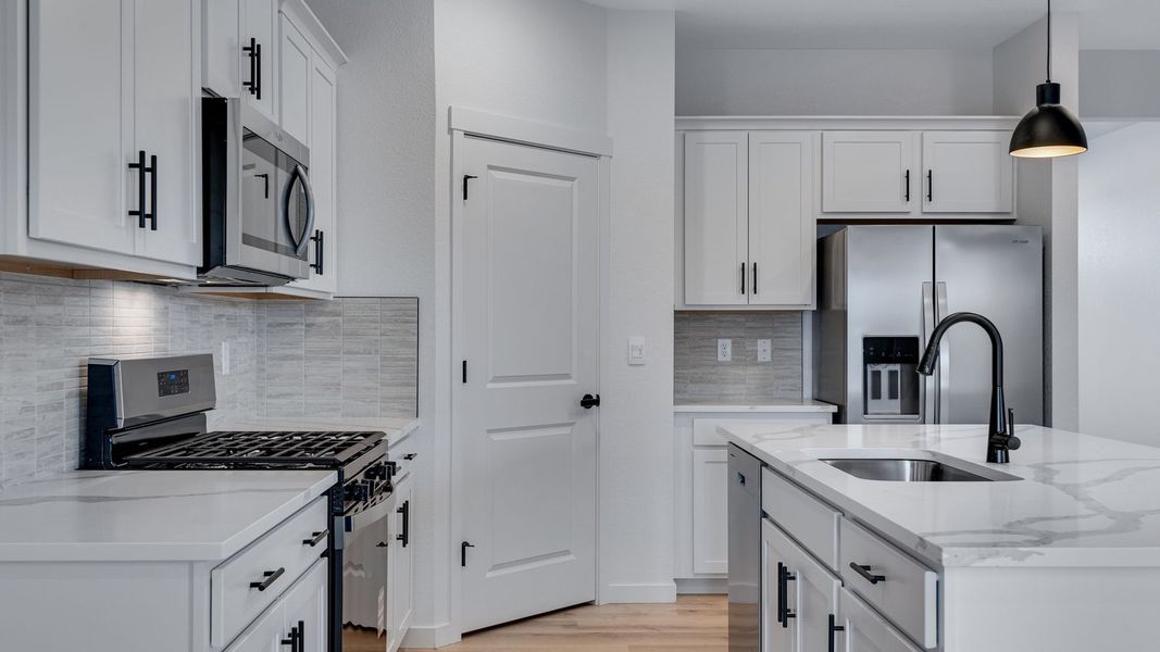 Furnished interior view inside a new home in Vista Meadows, Fort Lupton (Image 7).