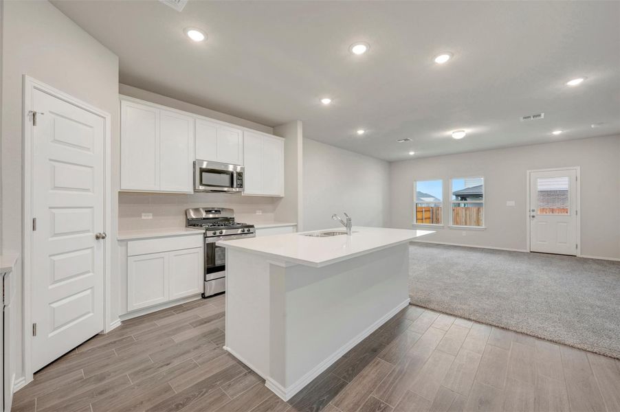 Furnished interior view inside a new home in Heritage, Dripping Springs (Image 9).
