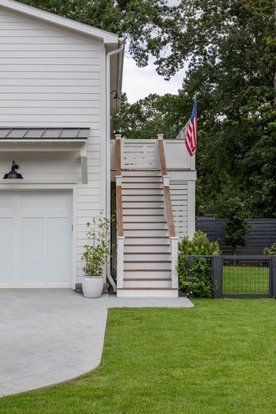 Front exterior of a new home in , Charleston, SC, highlighting curb appeal (Image 23).