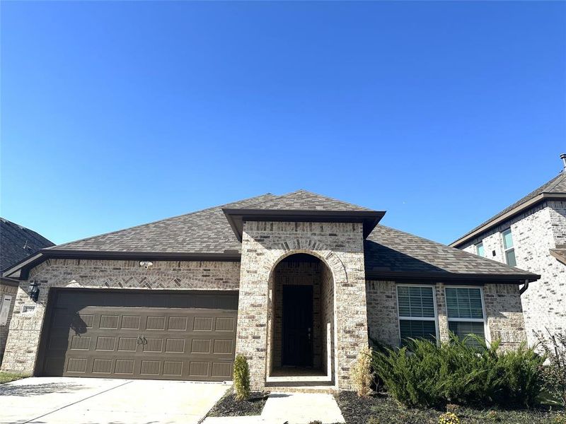 View of front facade with a garage