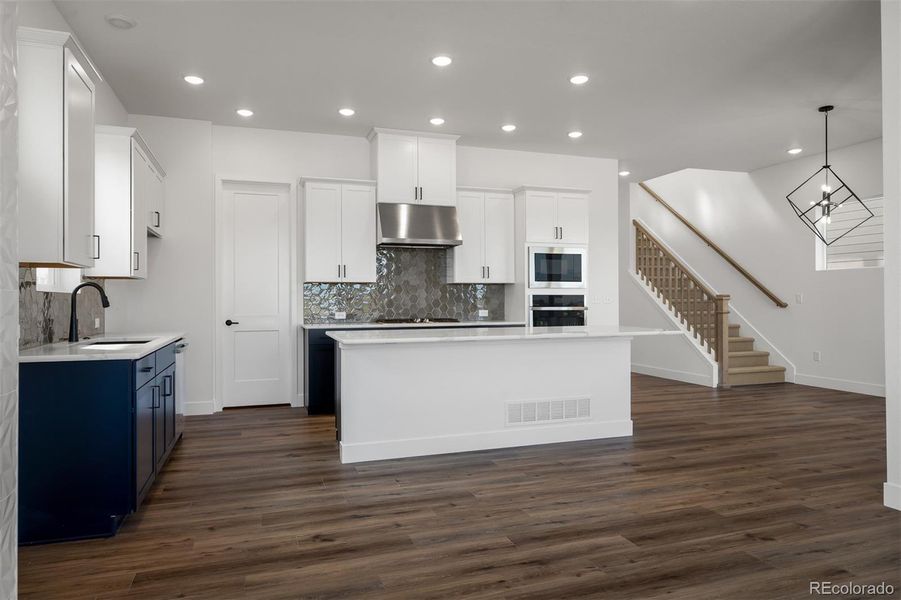 Furnished interior view inside a new home in Revel Crossing at Wolf Ranch - The Panorama Collection, Colorado Springs (Image 11).