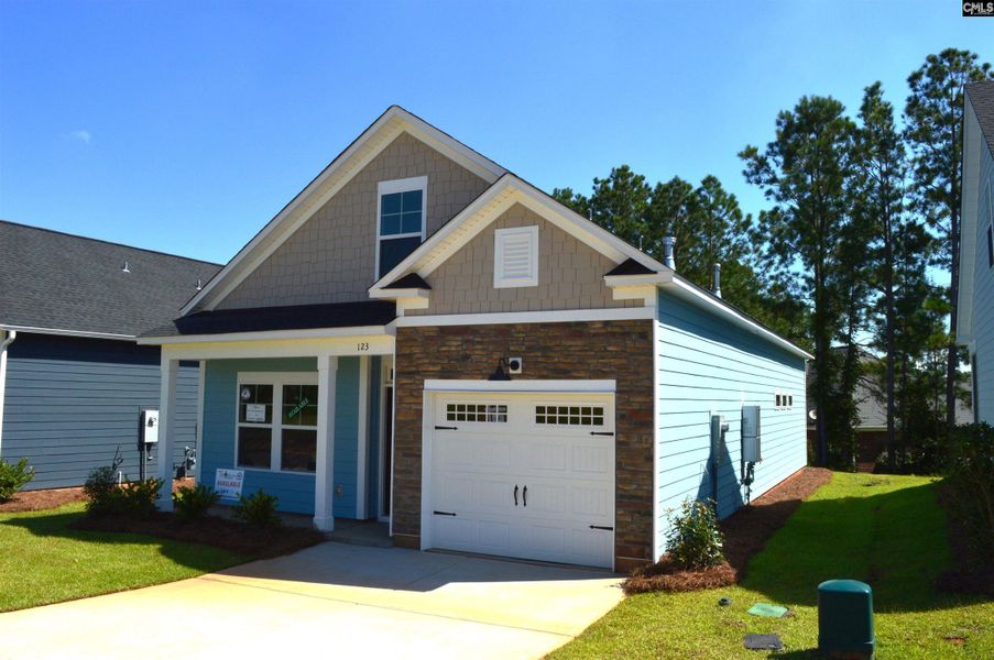 Front exterior of a new home in Bickley Station, Irmo, SC, highlighting curb appeal (Image 18).