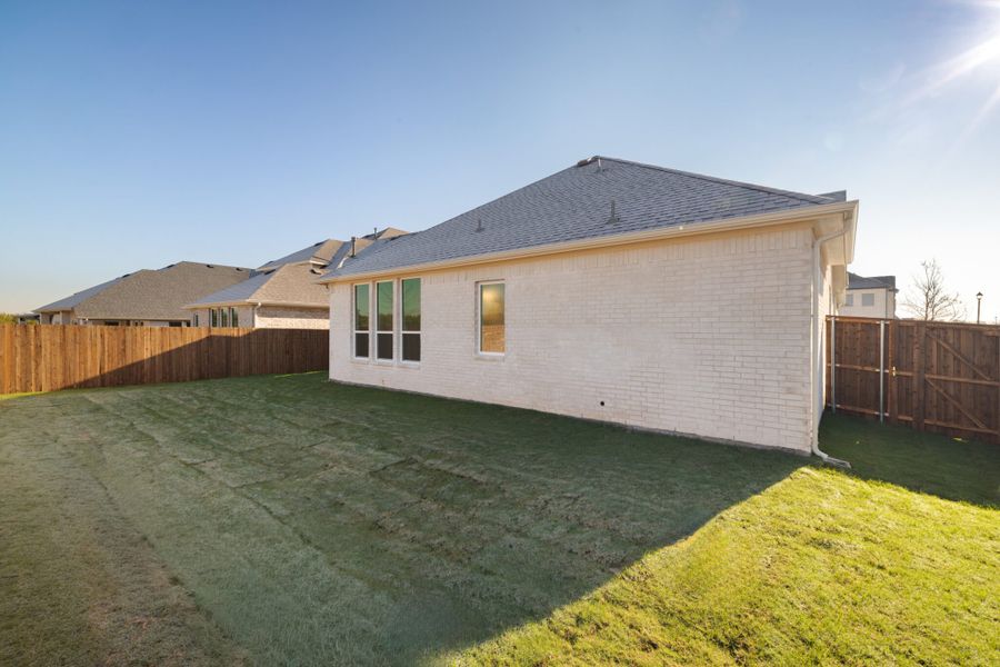 Exterior details and patio area of a home in Edgewater, Fate (Image 24).