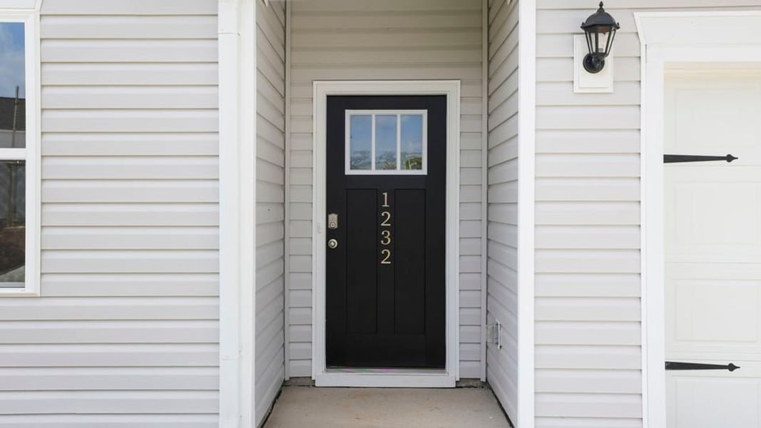 Exterior details and patio area of a home in Hunters Ridge, Woodruff (Image 4).