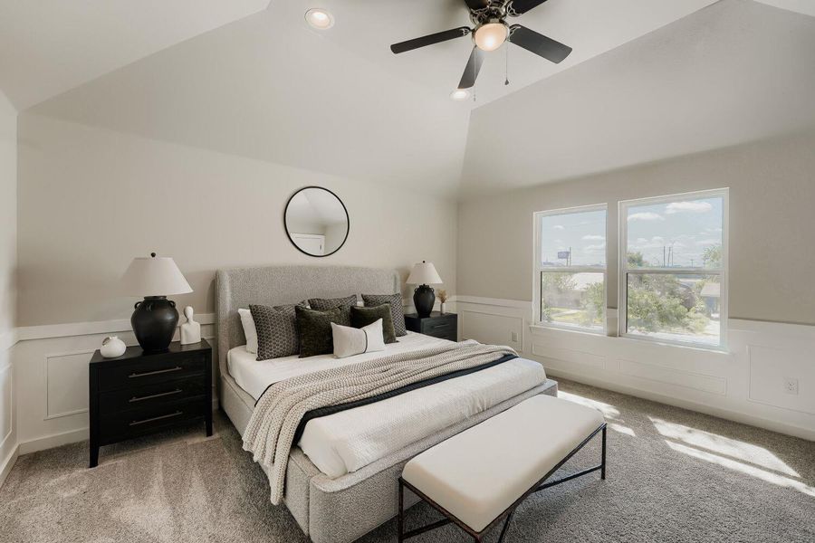Relax in this tranquil bedroom, featuring a vaulted ceiling and ample natural light. Relax in this tranquil bedroom, featuring a vaulted ceiling and ample natural light.