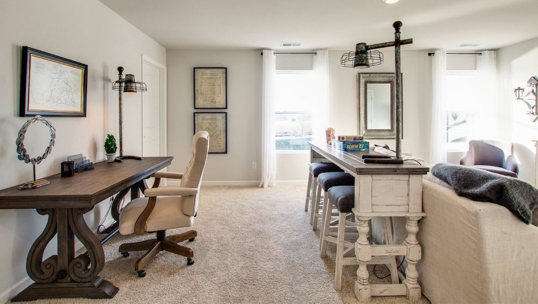 Representative furnished interior of a home built from the SALEM by D.R. Horton in Nexus North, Gallatin (Image 11).