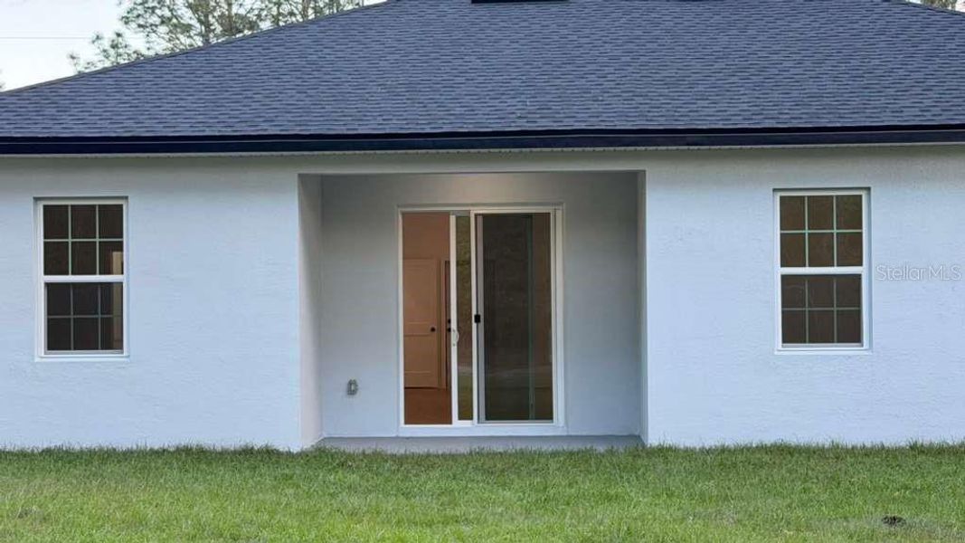 Exterior details and patio area of a home in , Citrus Springs (Image 29).
