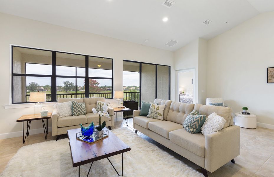 Gathering room with sliding glass door leading to lanai