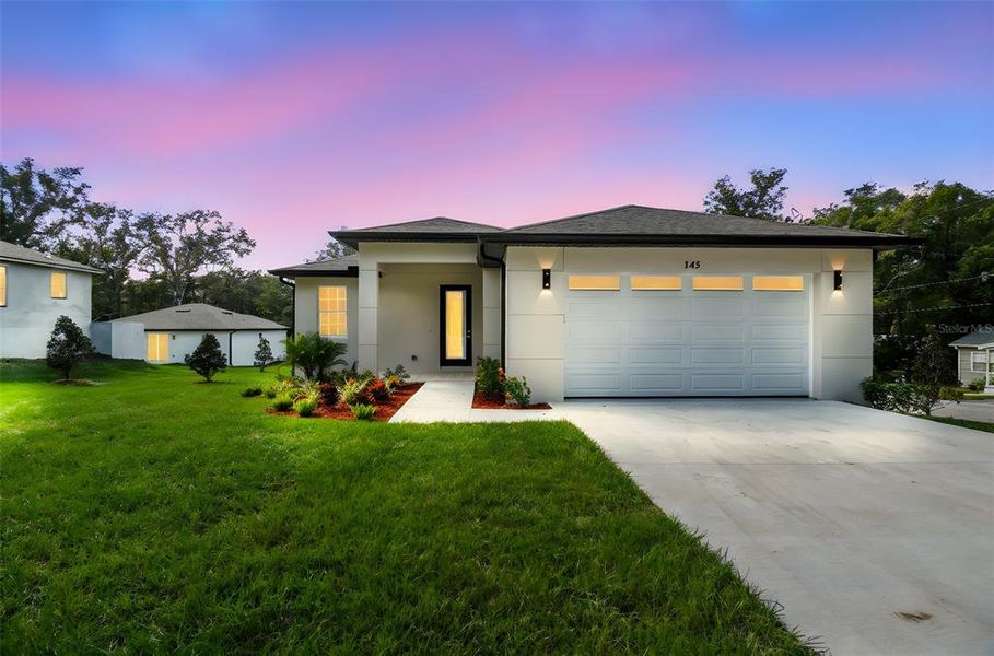 Front exterior of a new home in , Brooksville, FL, highlighting curb appeal (Image 22). Front exterior of a new home in , Brooksville, FL, highlighting curb appeal (Image 22).
