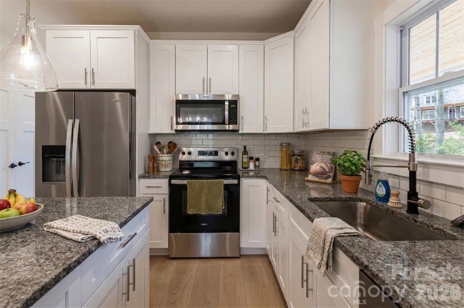 Furnished interior view inside a new home in , Fairview (Image 14).