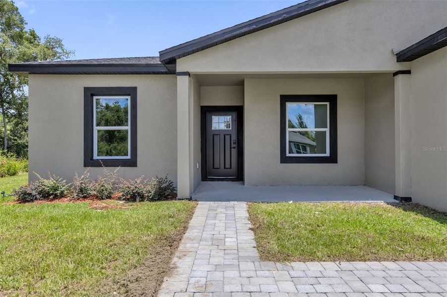 Exterior details and patio area of a home in , Ocala (Image 3).