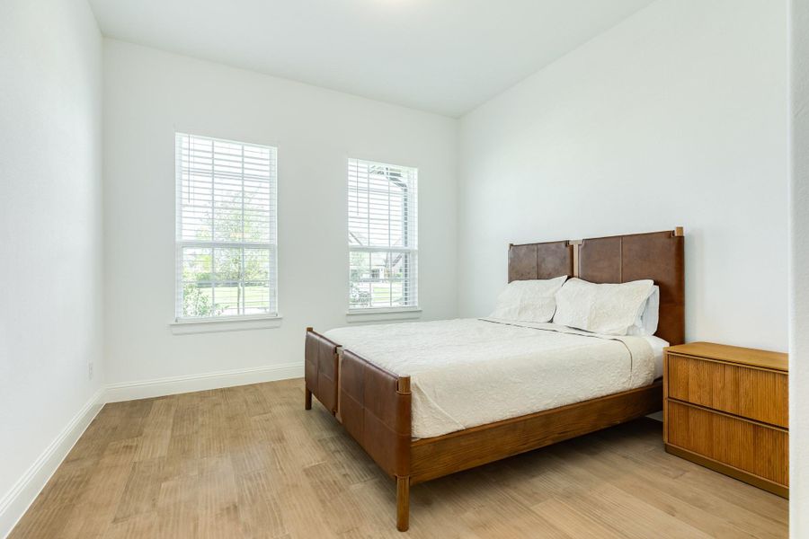 This view showcases the oversized windows, the spacious layout, and the generous dimensions of the private ensuite.