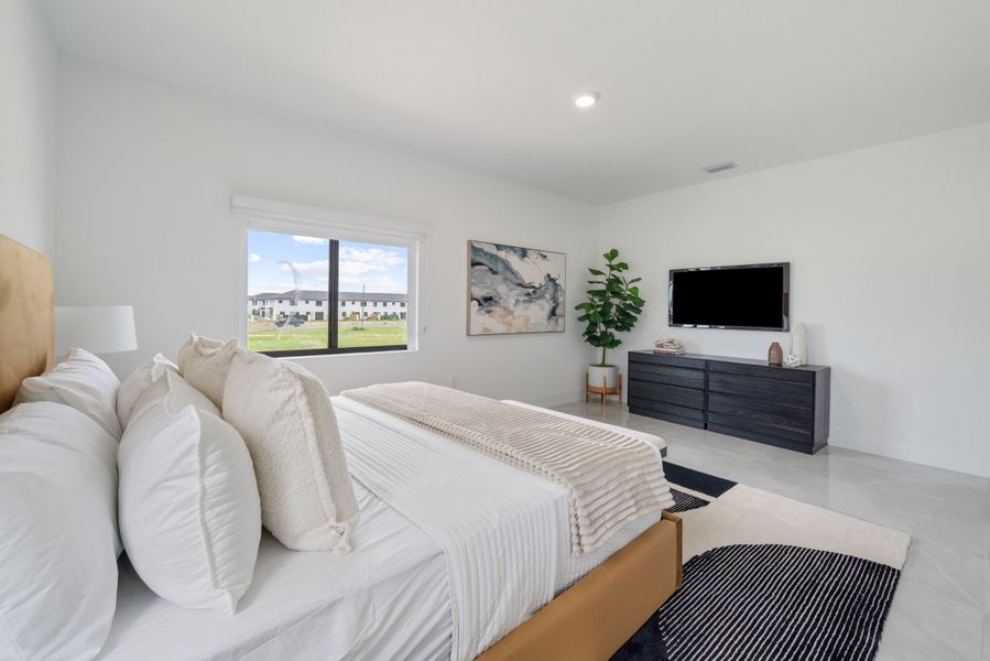Representative furnished interior of a home built from the Model E by Onx Homes in On Alba, Florida City (Image 45).