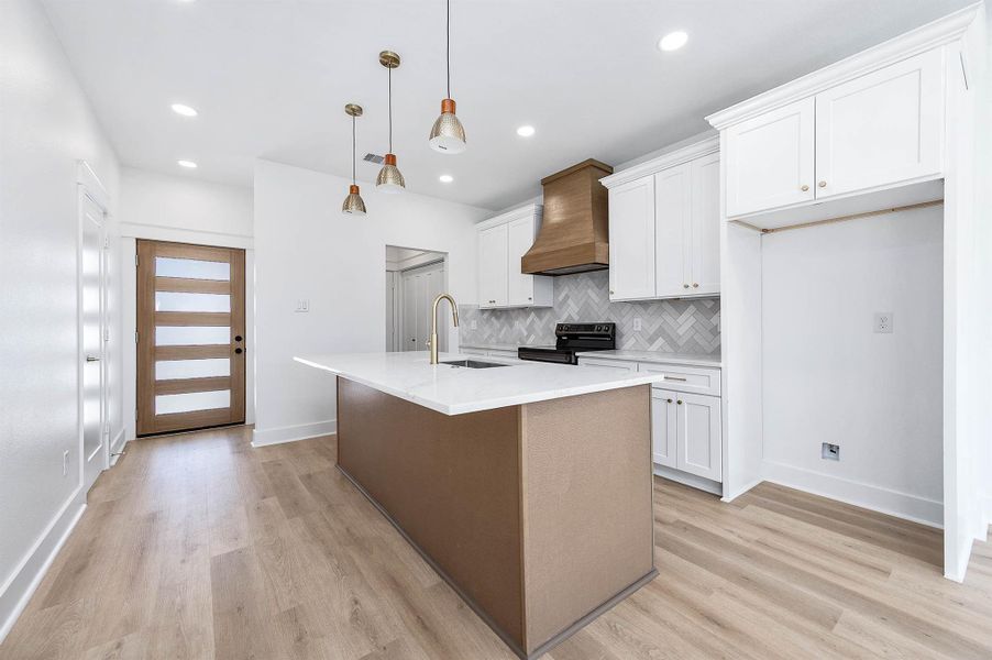Different angle showing the kitchen’s open layout. Different angle showing the kitchen’s open layout.