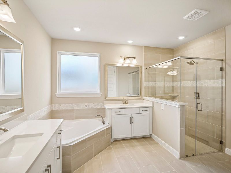 Furnished interior view inside a new home in Massey Oaks - Estate Series, Pearland (Image 8). Furnished interior view inside a new home in Massey Oaks - Estate Series, Pearland (Image 8).