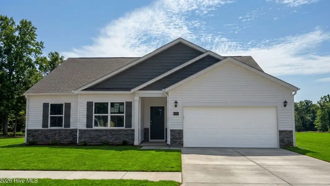 Front exterior of a new home in Beaver Dam Crossing, Bailey, NC, highlighting curb appeal (Image 1). Front exterior of a new home in Beaver Dam Crossing, Bailey, NC, highlighting curb appeal (Image 1).