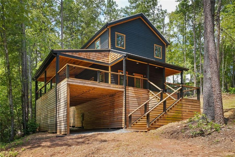 Front exterior of a new home in , Sautee Nacoochee, GA, highlighting curb appeal (Image 1). Front exterior of a new home in , Sautee Nacoochee, GA, highlighting curb appeal (Image 1).