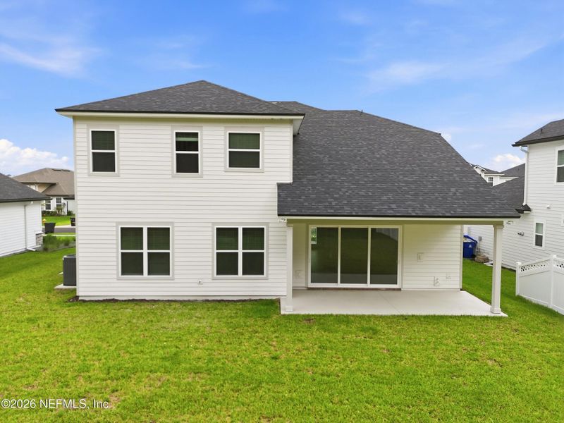 Exterior details and patio area of a home in Silver Landing At Silverleaf, St. Augustine (Image 32).