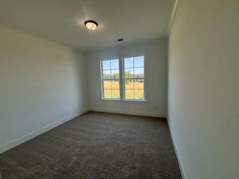 Spacious, unfurnished interior of a new home in Pinegate, Covington (Image 28).