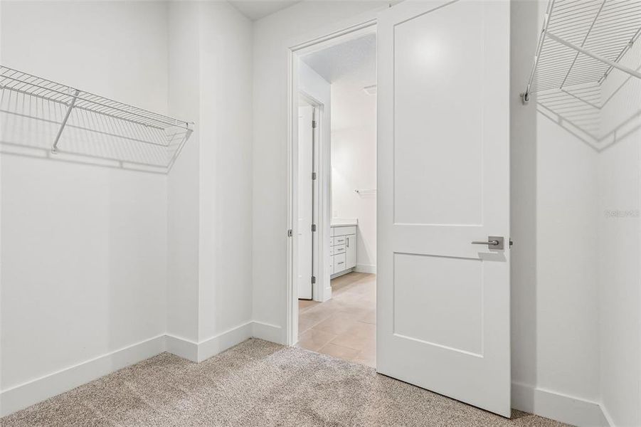 Spacious, unfurnished interior of a new home in Lakeside at Satilla, St. Cloud (Image 23).