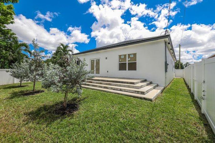Front exterior of a new home in , Fort Lauderdale, FL, highlighting curb appeal (Image 18). Front exterior of a new home in , Fort Lauderdale, FL, highlighting curb appeal (Image 18).