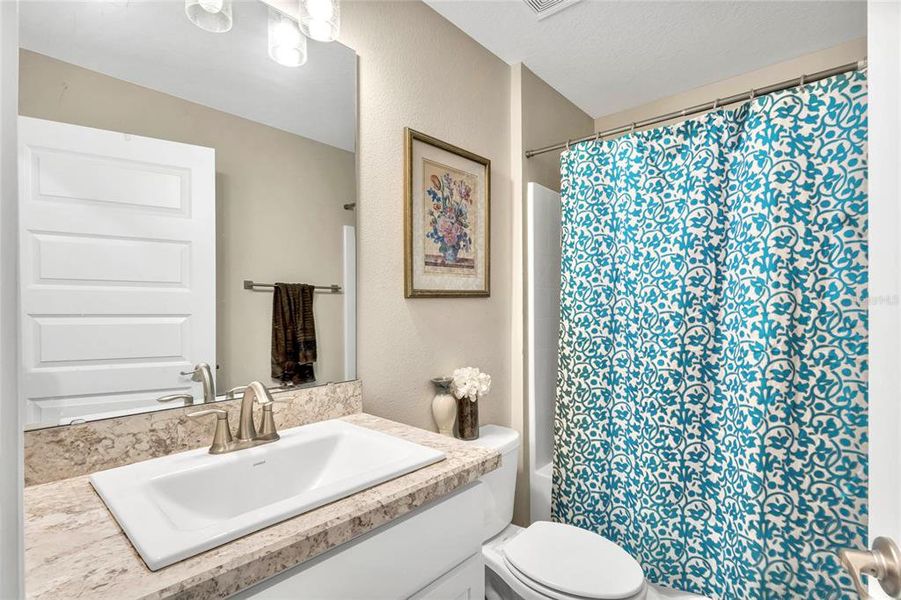 Furnished interior view inside a new home in Poinciana Enclave, Kissimmee (Image 11).
