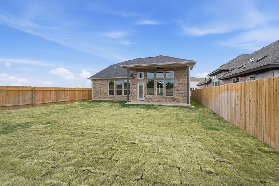 Exterior details and patio area of a home in Santa Rita Ranch, Liberty Hill (Image 28).