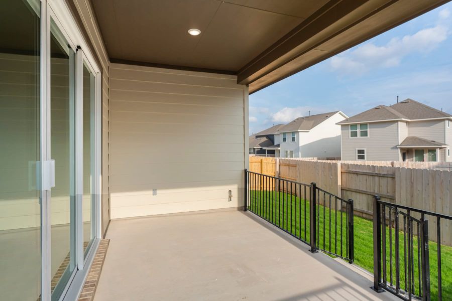 Exterior details and patio area of a home in Lariat, Liberty Hill (Image 21).