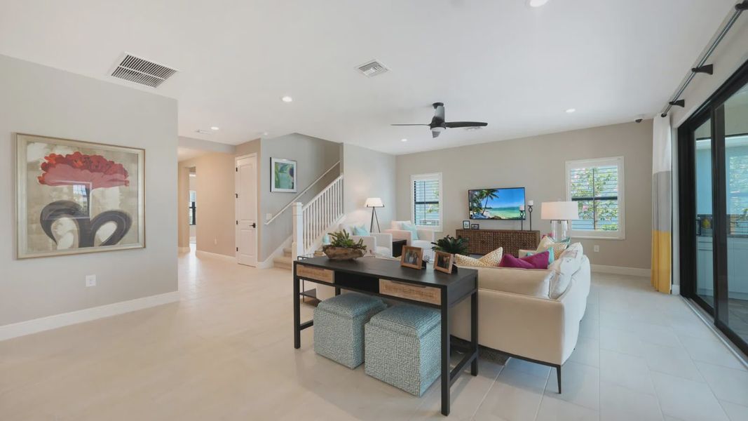 Representative furnished interior of a home built from the Artistry by Neal Communities in SkySail, Naples (Image 23).