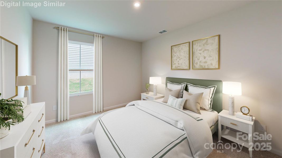 A generous first-floor primary suite promises a private, serene escape for family and guests, its window looking out to a quiet backyard. A generous first-floor primary suite promises a private, serene escape for family and guests, its window looking out to a quiet backyard.