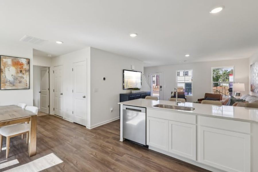 A kitchen with white cabinets. A kitchen with white cabinets.