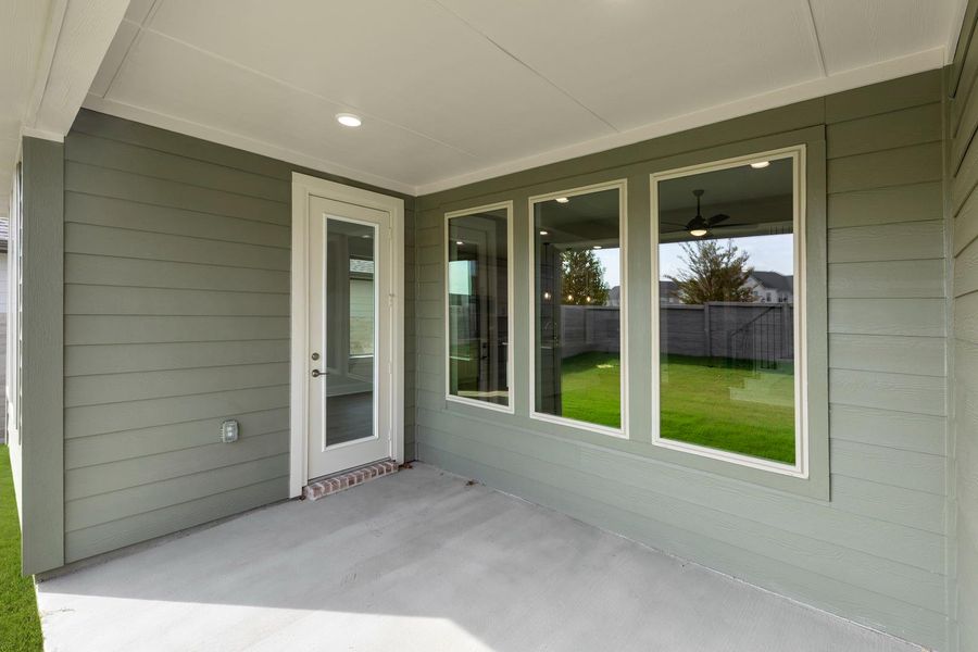 Exterior details and patio area of a home in Discovery Collection at Painted Tree Village, McKinney (Image 3). Exterior details and patio area of a home in Discovery Collection at Painted Tree Village, McKinney (Image 3).