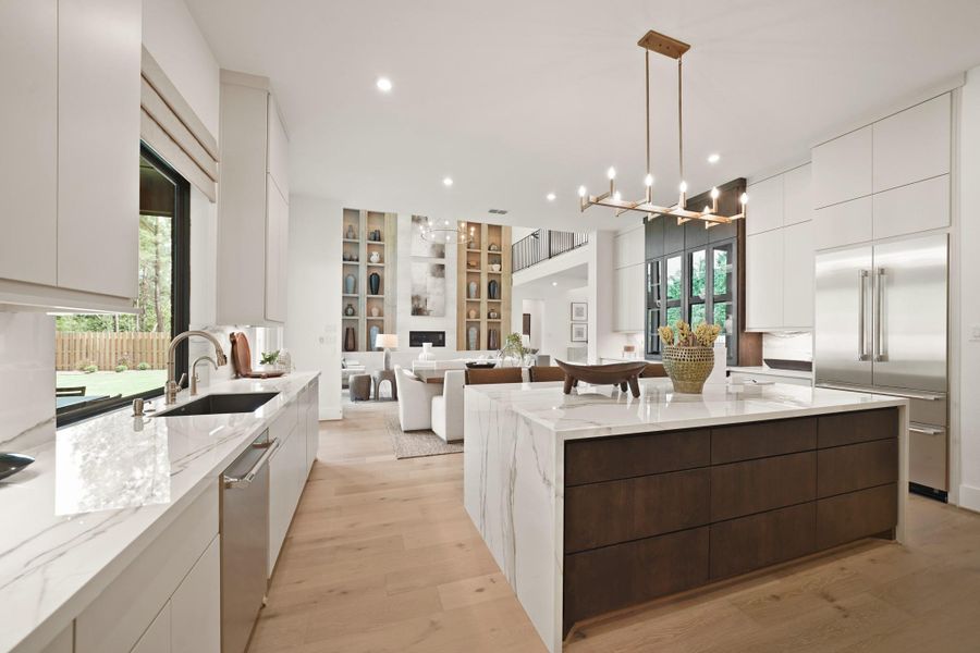 The pristine kitchen with a sink which overlooks the covered patio. Representational image.