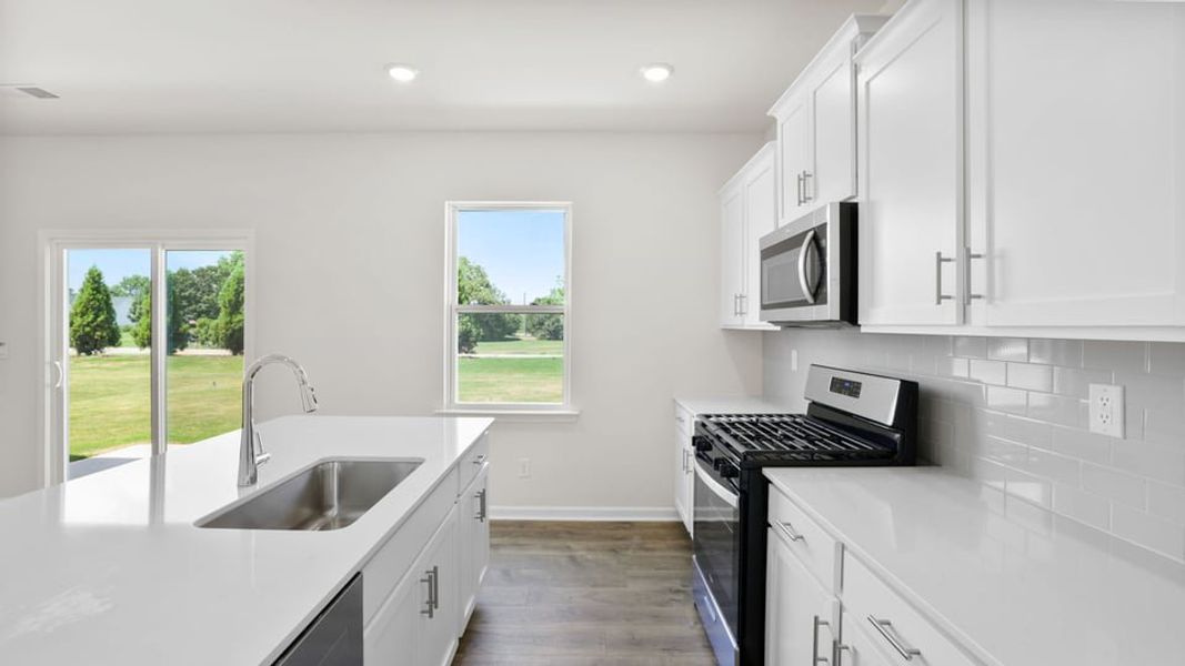 Furnished interior view inside a new home in Durbin Meadows Traditions, Fountain Inn (Image 10).