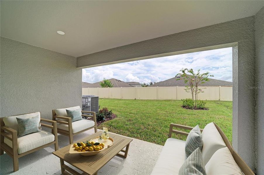 Exterior details and patio area of a home in Crosswind Point, Parrish (Image 21).