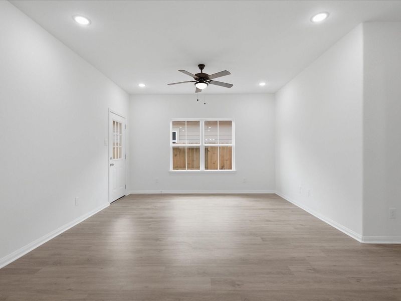 The spacious living room is designed for modern living, with soaring ceilings and an open-concept layout that keeps everyone connected. The spacious living room is designed for modern living, with soaring ceilings and an open-concept layout that keeps everyone connected.