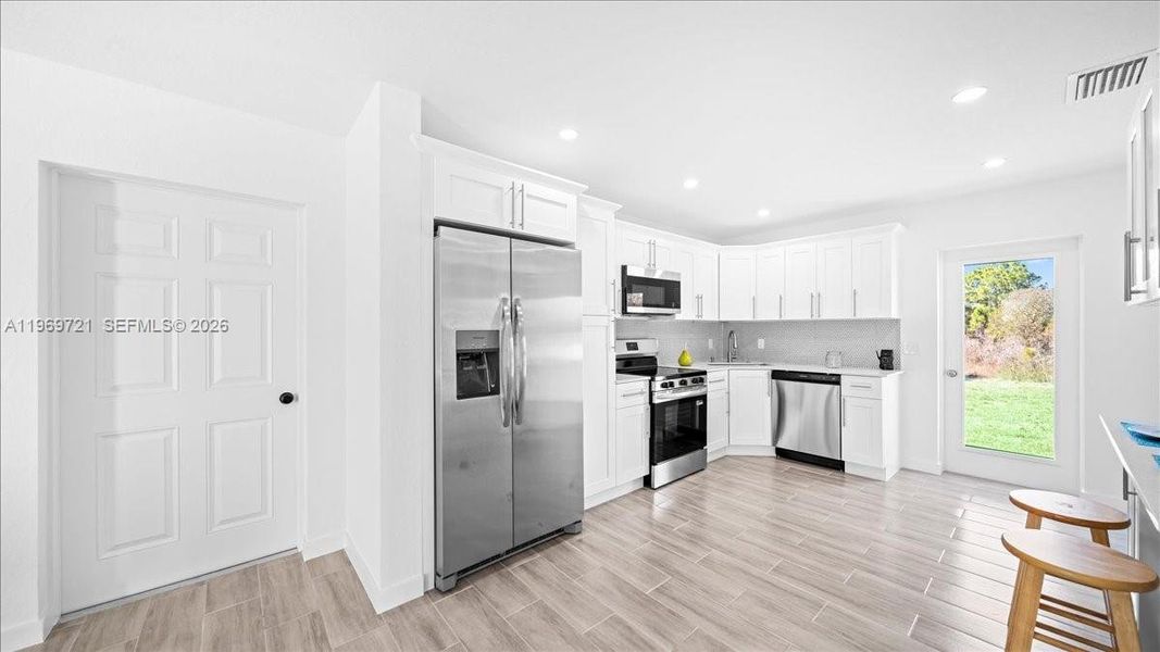 Furnished interior view inside a new home in , Lehigh Acres (Image 5).