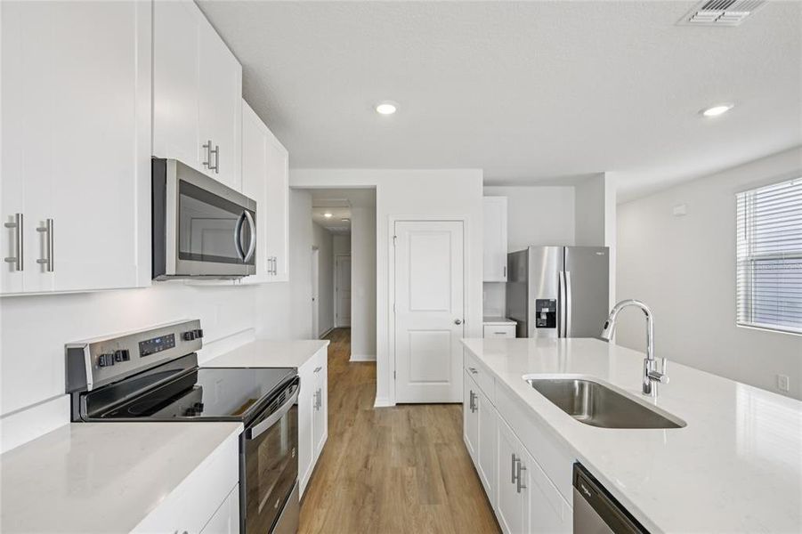 Furnished interior view inside a new home in Salt Meadows - Premier Series, Parrish (Image 9).