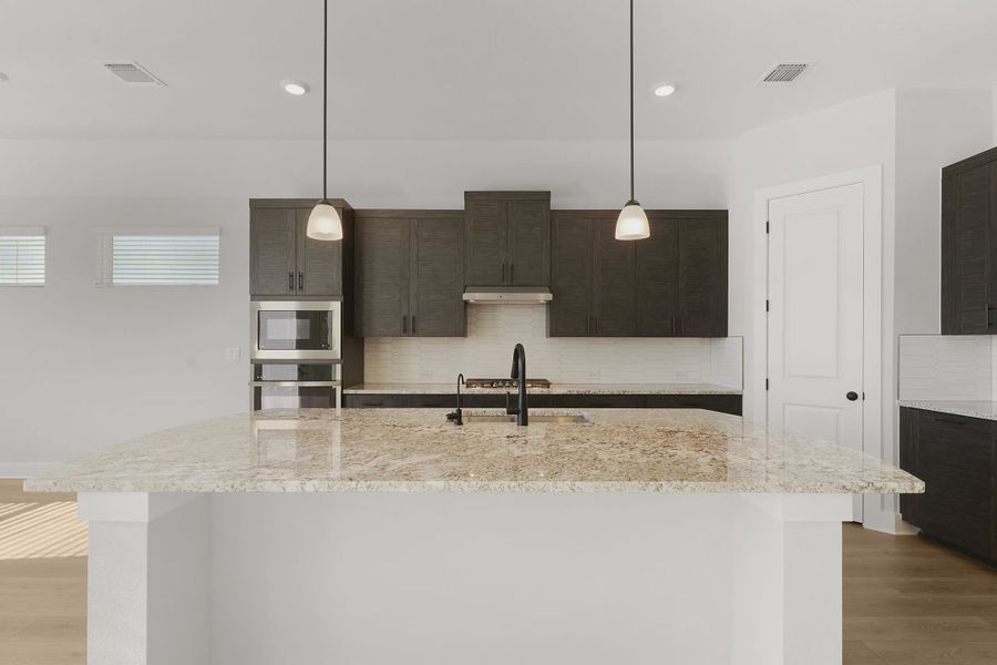 Representative furnished interior of a home built from the Barron by Chesmar Homes in Lariat, Liberty Hill (Image 13).