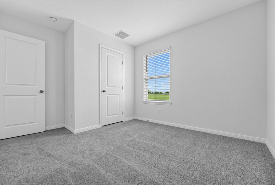 Spacious, unfurnished interior of a new home in Sunfield, Buda (Image 19).