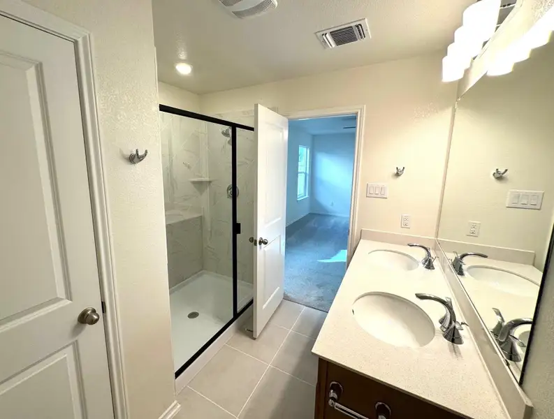 Furnished interior view inside a new home in Sonterra - Cool Water, Jarrell (Image 8).