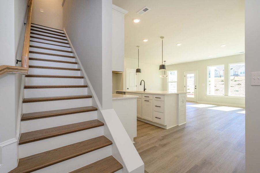 Representative unfurnished interior of a home built from the The Thornhurst by David Weekley Homes in Westview Towns, Waxhaw (Image 6).