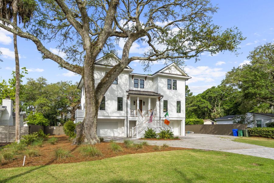Front exterior of a new home in , Isle Of Palms, SC, highlighting curb appeal (Image 24). Front exterior of a new home in , Isle Of Palms, SC, highlighting curb appeal (Image 24).