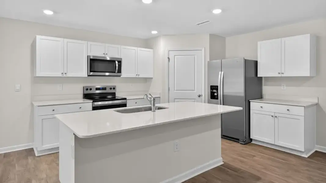 Furnished interior view inside a new home in Mangum Farms, Stem (Image 6).