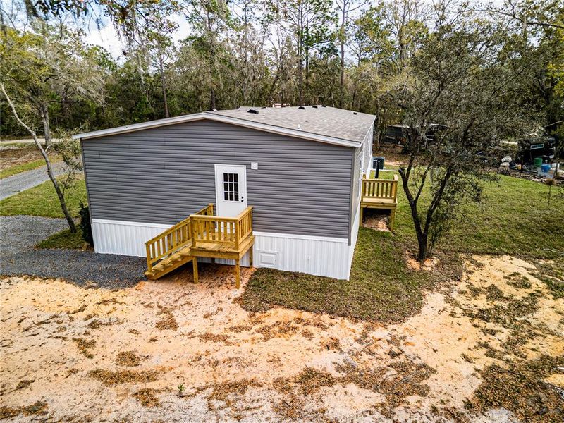 Exterior details and patio area of a home in , Frostproof (Image 18). Exterior details and patio area of a home in , Frostproof (Image 18).