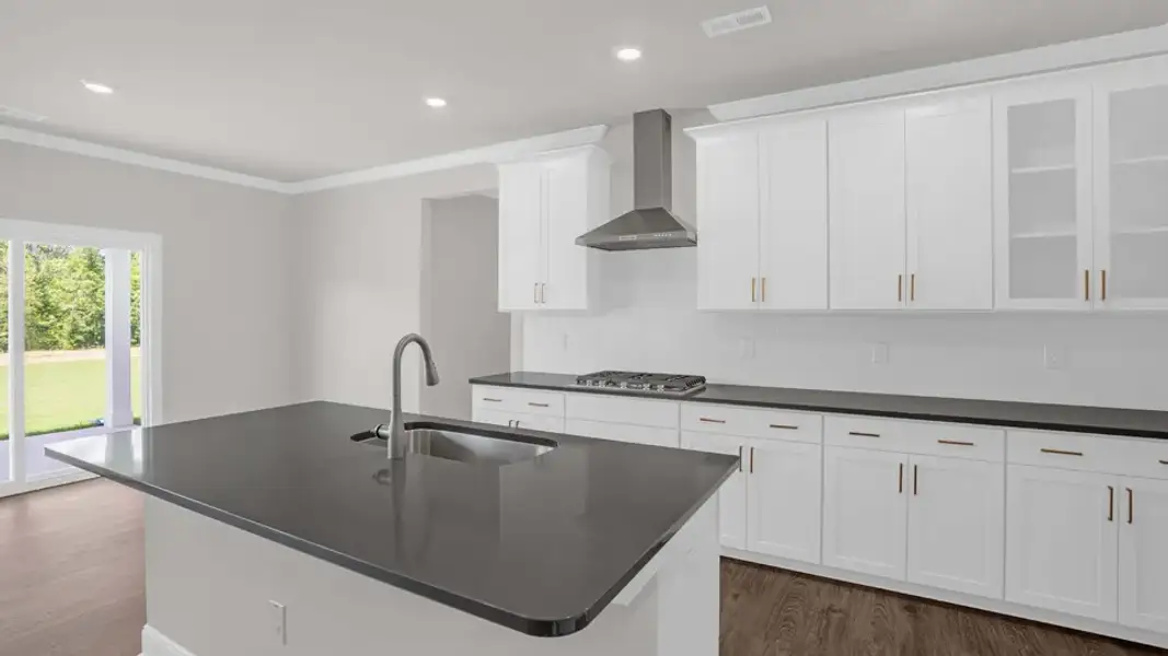Furnished interior view inside a new home in The Estates Park, Apex (Image 7).